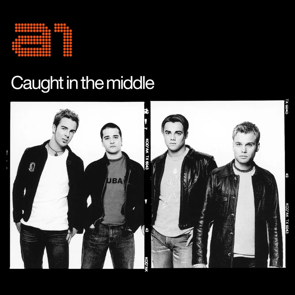 CAUGHT IN THE MIDDLE by A1 cover